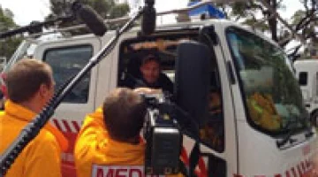 Is Opposition Leader Tony Abbott 'Doing Important Things' for the
Rural Fire Brigade?